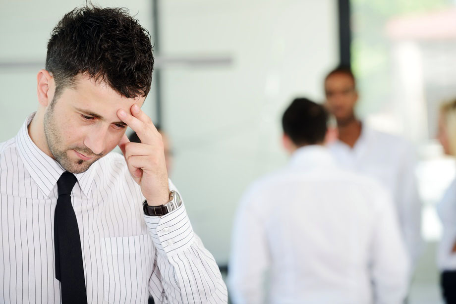 Business people with stress and worries in office